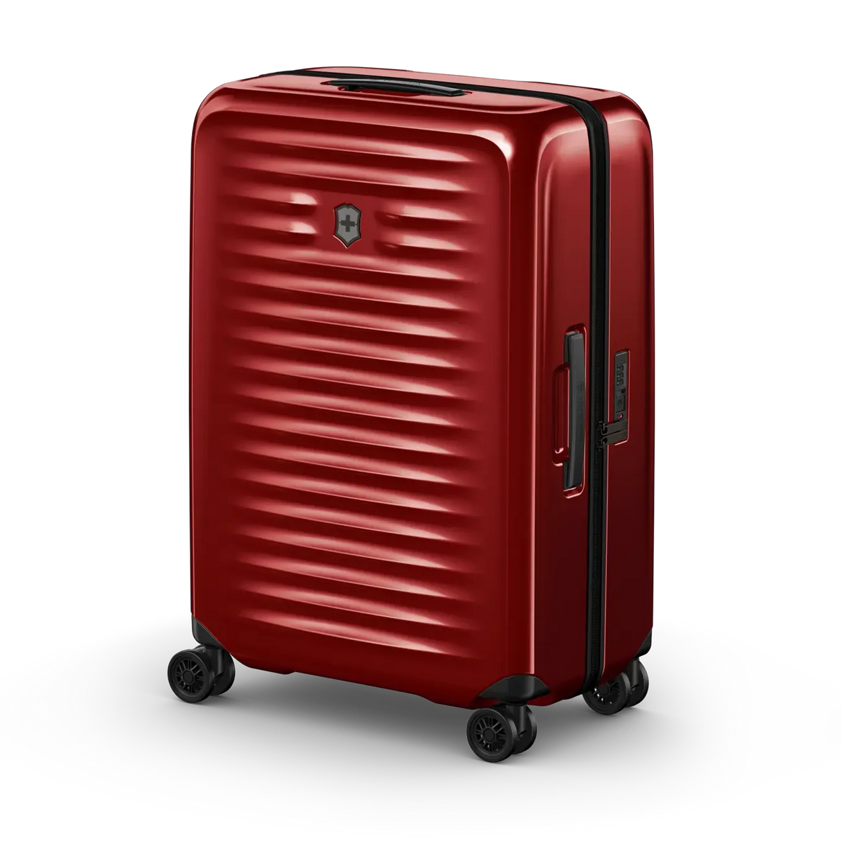 Red hardshell rolling suitcase with horizontal ridges and wheels.