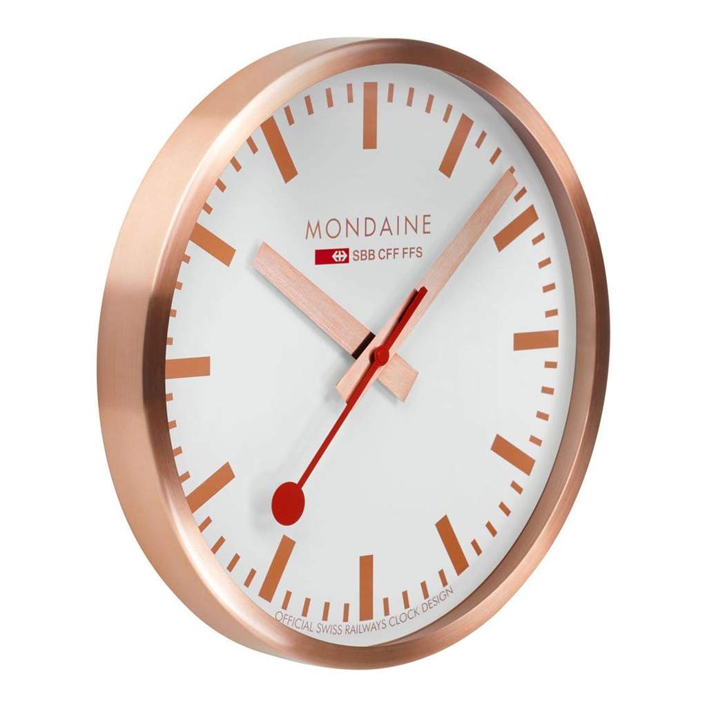 Rose gold-framed wall clock with a white face and red accents.