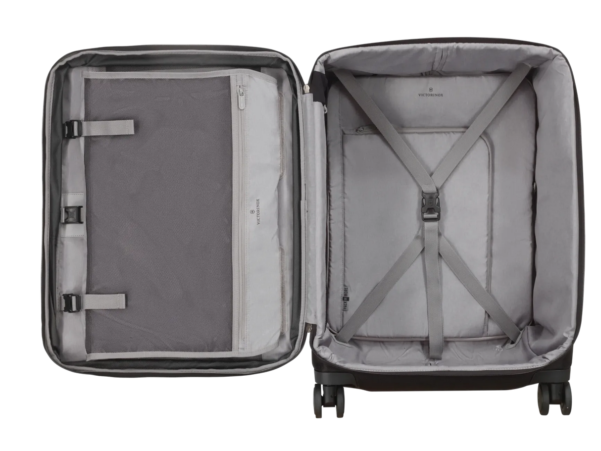 Open suitcase with interior compartments and straps visible.