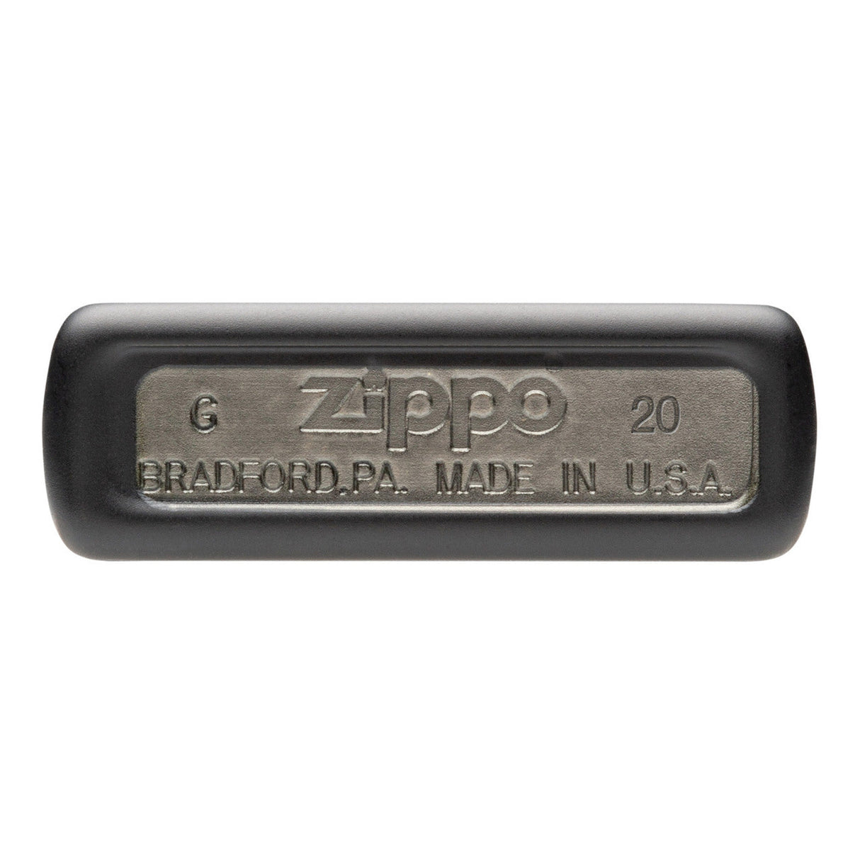 Zippo lighter bottom with embossed text showing brand and origin details.