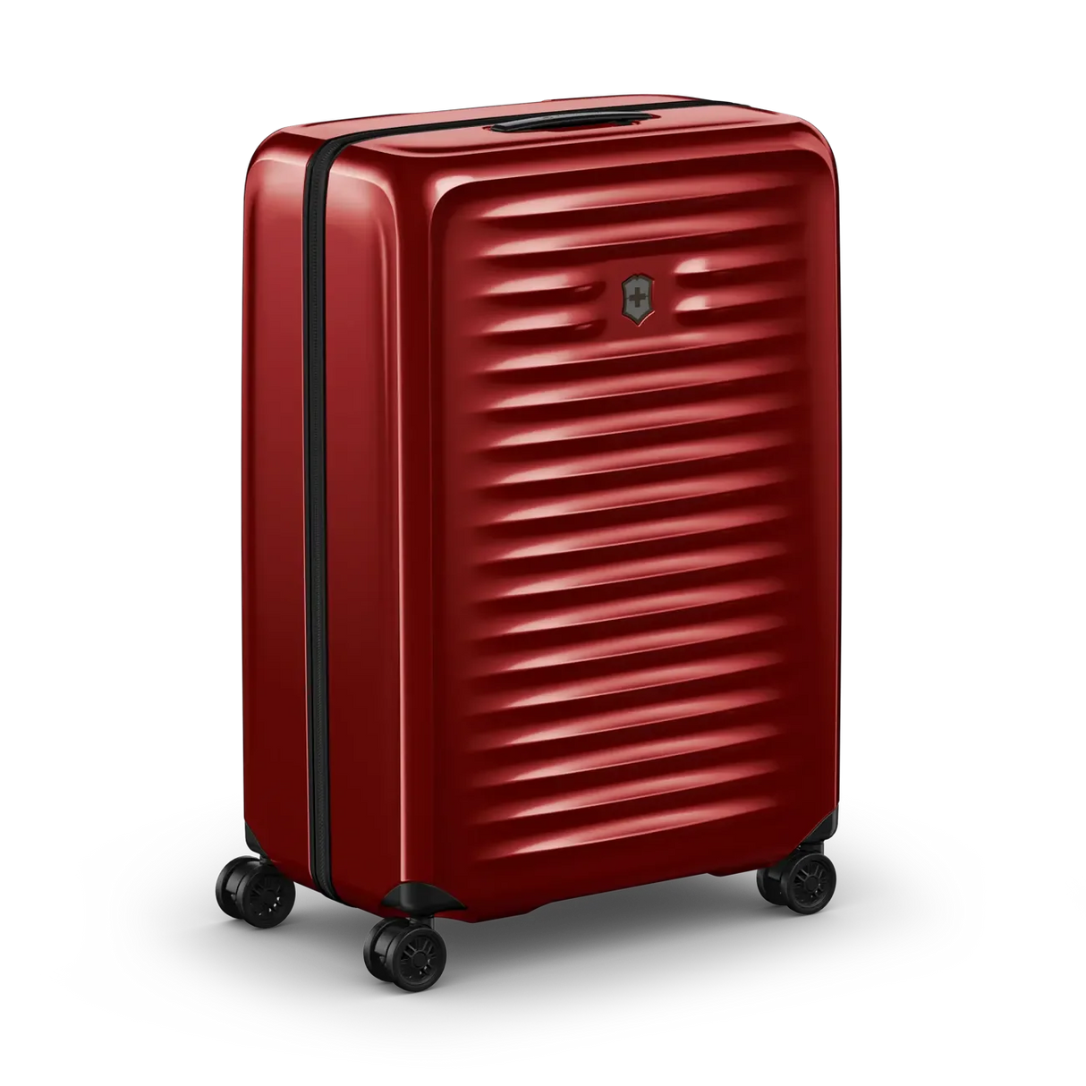 Red hardshell rolling suitcase with horizontal ridges and wheels.