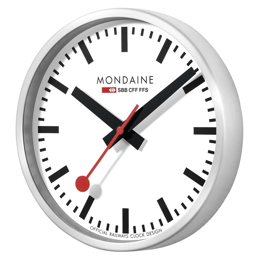 Classic Swiss railway-style wall clock with a white face and red second hand.