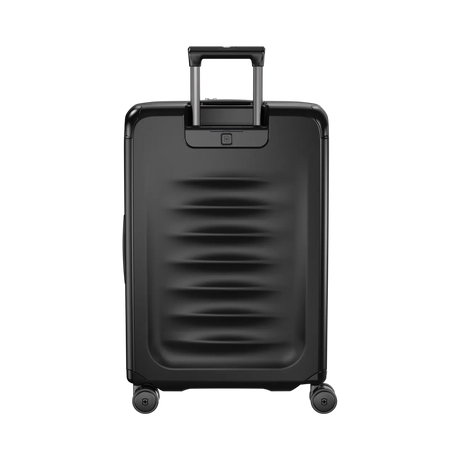 Black hardshell rolling suitcase with horizontal ridges and a retractable handle.