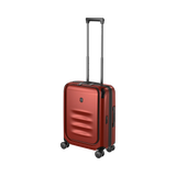 Red hardshell rolling suitcase with an extendable handle and wheels.