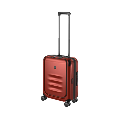 Red hardshell rolling suitcase with an extendable handle and wheels.