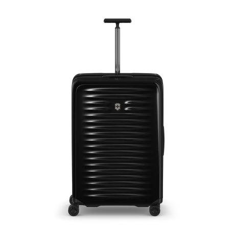 Black hard-shell rolling suitcase with horizontal ridges and an extendable handle.