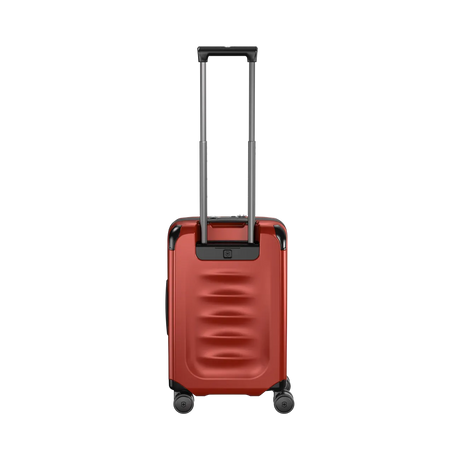 Red hardshell rolling suitcase with an extendable handle and wheels.