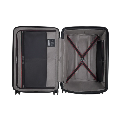 Open suitcase showing its interior compartments and straps.