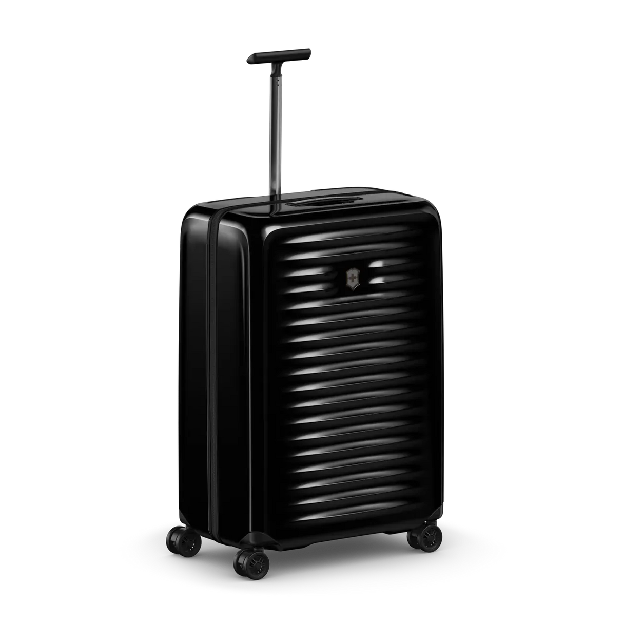 Black hardshell rolling suitcase with horizontal ridges and an extendable handle.