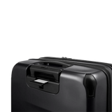 Black hard-shell suitcase with a retractable handle.