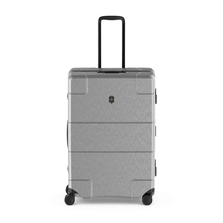 Gray hardshell rolling suitcase with a retractable handle and wheels.
