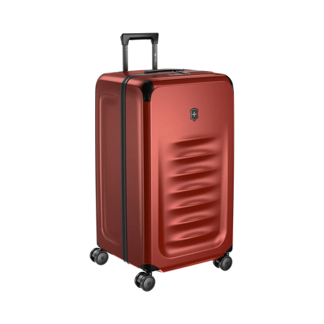 Red hardshell rolling suitcase with a retractable handle and wheels.