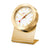 Gold-colored desk clock with a white face and red second hand.