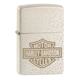 Zippo lighter with a Harley-Davidson logo engraved on its textured metallic surface.