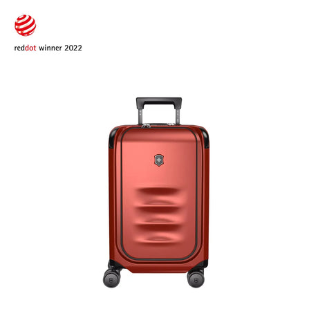 Red metallic hardshell carry-on suitcase with wheels and a retractable handle.