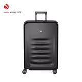Black hardshell rolling suitcase with horizontal ridges and a retractable handle.