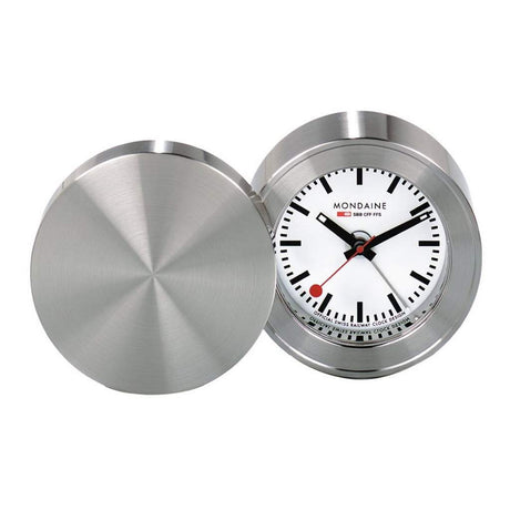 Sleek, round, stainless steel travel alarm clock with a classic white dial face.