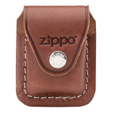 Brown leather pouch with ’Zippo’ logo and snap closure for carrying a lighter.