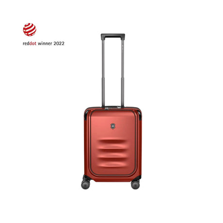 Red hardshell rolling suitcase with a telescoping handle and wheels.