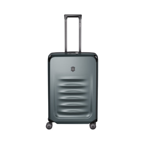 Gray hardshell rolling suitcase with horizontal ridges on the front.