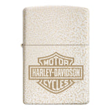 Zippo lighter with a Harley-Davidson logo engraved on a textured cream-colored surface.