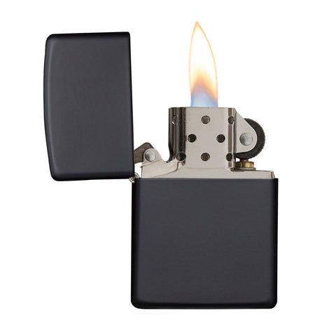 Lit black metal cigarette lighter with an open flame.
