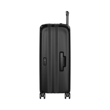 Black hardshell rolling suitcase with vertical ridges and a retractable handle.