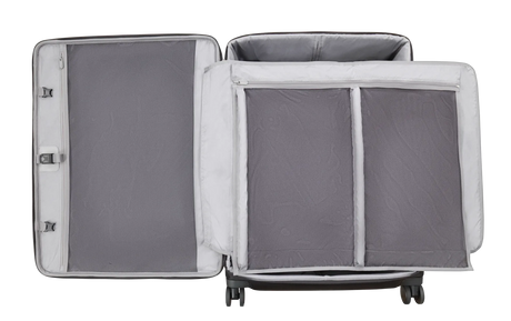 Wheeled suitcase with multiple compartments opened to display its interior organization.