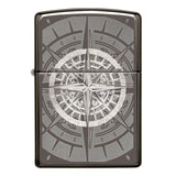 Zippo lighter featuring an engraved compass rose design.