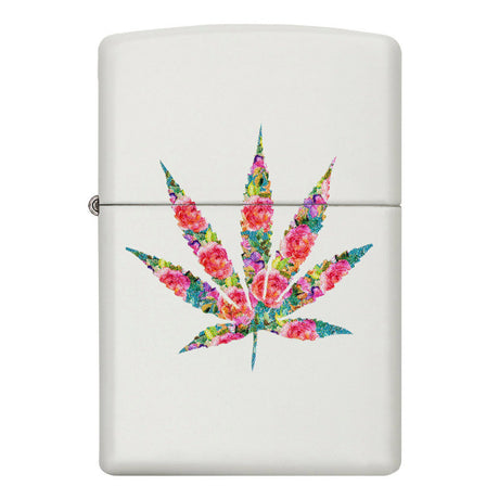 Zippo-style lighter with a colorful floral marijuana leaf design on a white background.