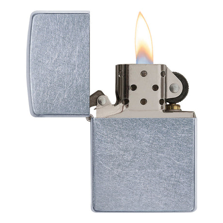 Metal zippo-style lighter with a lit flame.