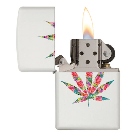 Zippo-style lighter with a colorful floral marijuana leaf design on a white background.