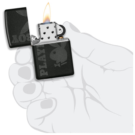 Black Zippo-style lighter with ’Playboy’ branding and a lit flame.