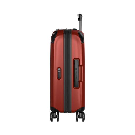 Red hardshell rolling suitcase with black trim and wheels.
