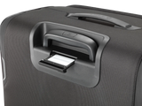 Suitcase handle with an integrated luggage tag slot.