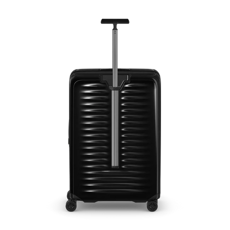 Black hard-shell rolling suitcase with horizontal ridges and an extendable handle.