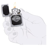 Harley-Davidson branded metal lighter with a lit flame.