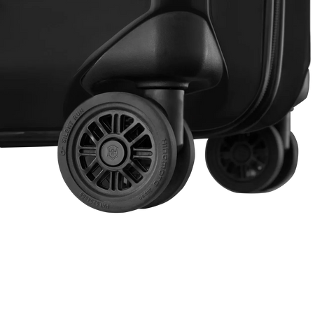 Wheels of a rolling suitcase or luggage.