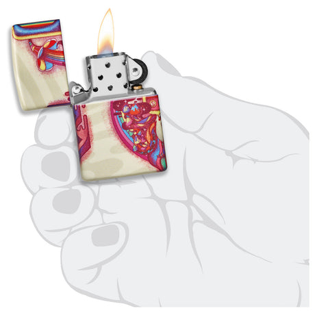Lit Zippo-style lighter with colorful floral design on its case.