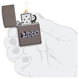 Lit Zippo lighter with an open flame held in a sketched hand.