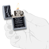 Lit Jack Daniel’s Tennessee Whiskey branded Zippo-style lighter.