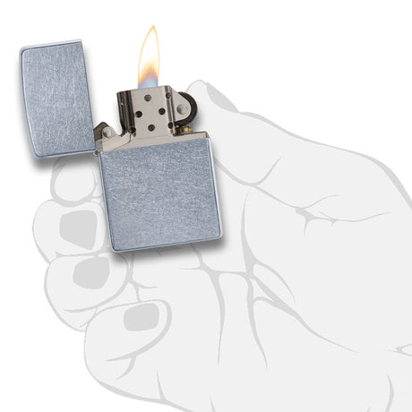 Metal zippo-style lighter with an open flame.