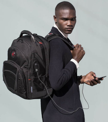 Black backpack with multiple compartments and red accents.