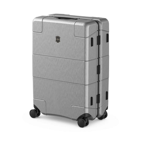 Gray hardshell suitcase with wheels and a segmented design.