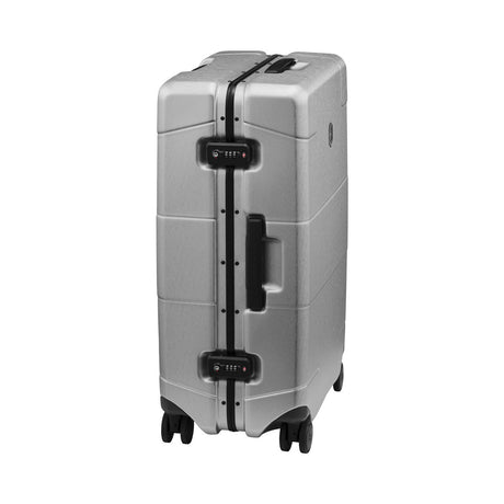Hard-shell rolling suitcase with a combination lock and side handle.
