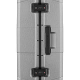 Hardshell suitcase with combination locks and a handle.