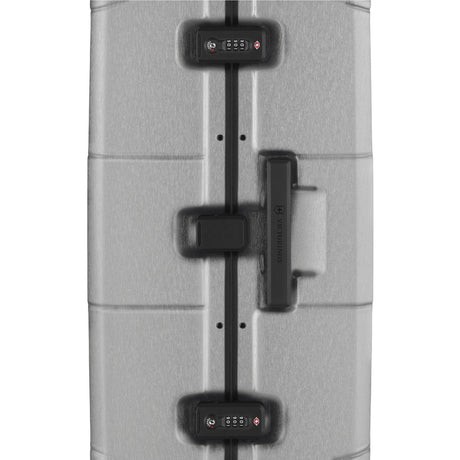 Suitcase with electronic locks and a handle visible through an X-ray-like image.