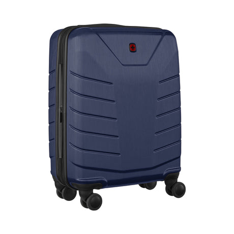 Navy blue hardshell rolling suitcase with horizontal ridges and four wheels.