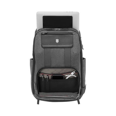 Gray backpack with multiple compartments and a laptop sleeve.
