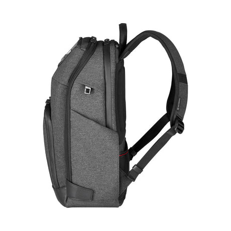 Gray backpack with multiple compartments and padded straps.